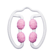 a pair of pink balls on a white handle