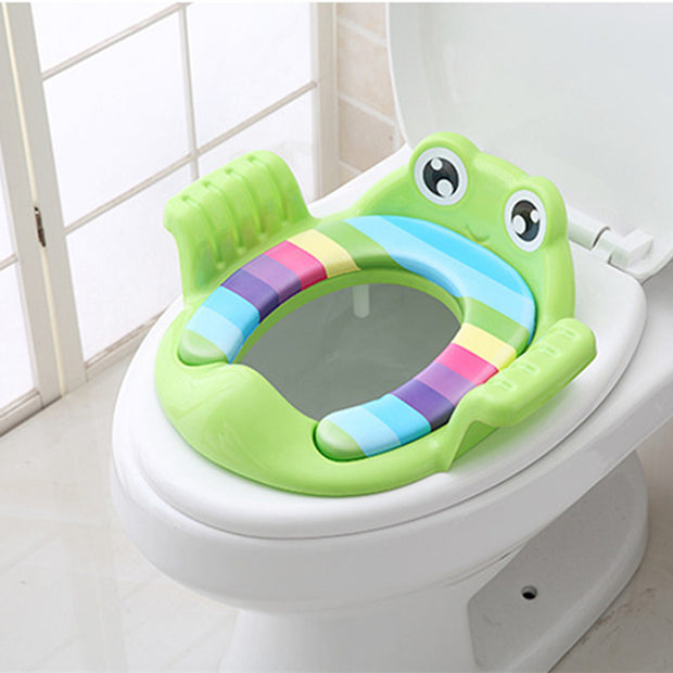 a child's potty seat in the shape of a frog