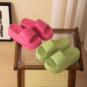 a pair of slippers sitting on top of a table